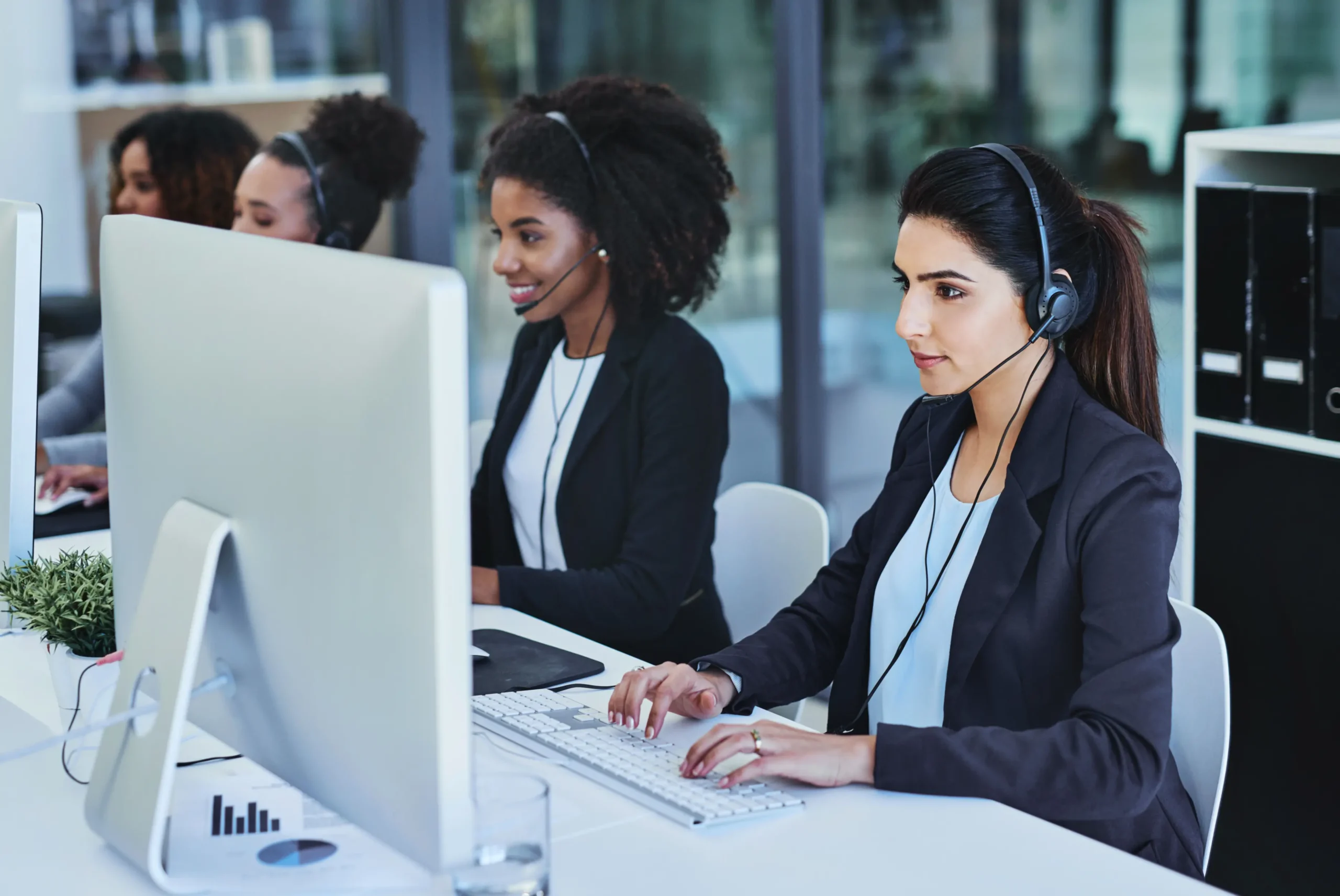 Business process outsourcing (BPO) 1 woman headset call center office crm customer service conversation online support team telemarketing consultant career diversity female people hotline agent scaled